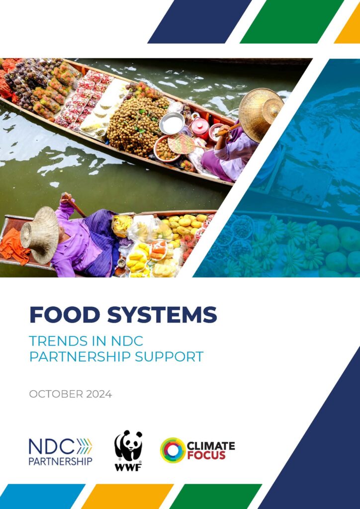 Report Cover "Food Systems: Trends in NDC Partnership Support" Featuring photos of women in canoes with produce to sell